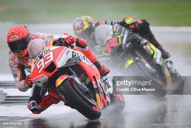 Marc Marquez of Spain and Marco Bezzecchi of Italy in action during the MotoGP of Great Britain - Second Free Practice at Silverstone Circuit on...