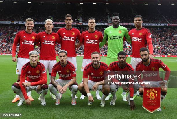 The Manchester United team lines up ahead of the pre-season friendly match between Manchester United and RC Lens at Old Trafford on August 05, 2023...