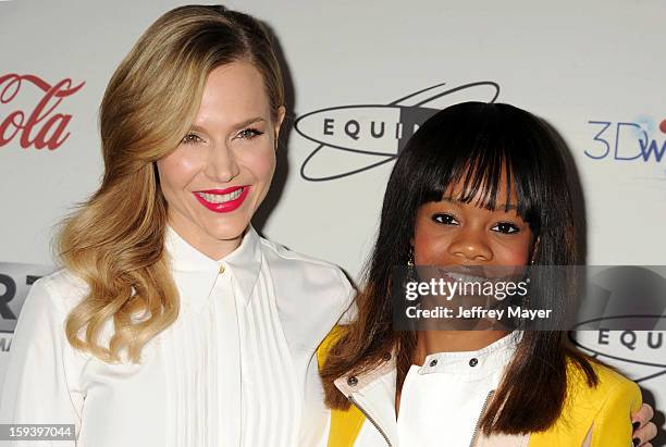 Julie Benz and Gabby Douglas arrives at CW3PR Presents the inaugural 'Gold Meets Golden' event at New Equinox Flagship on January 12, 2013 in Los...