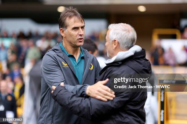 Julen Lopetegui, Manager of Wolverhampton Wanderers and Bruno Genesio, Head Coach of Stade Rennais interact prior to the pre-season friendly match...