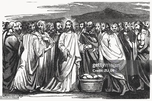 feeding of the four thousand (matthew 15), woodcut, published 1837 - miracle stock illustrations