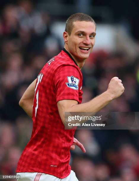 Nemanja Vidic of Manchester United celebrates scoring the second goal during the Barclays Premier League match between Manchester United and...