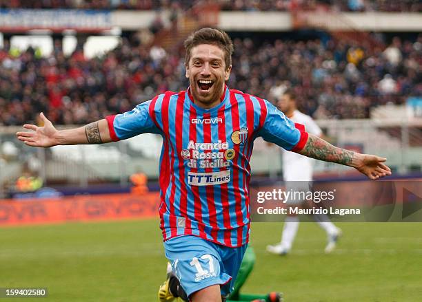 Alejandro Gomez of Catania celebrates after scoring his team's opening goal during the Serie A match between Calcio Catania and AS Roma at Stadio...