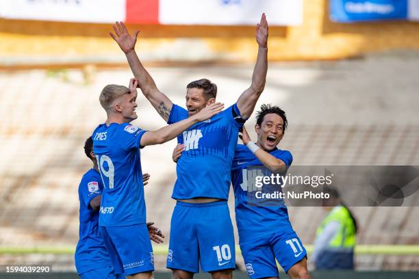 Lukas Jutkiewicz of Birmingham and teammates celebrate scoring their side's first goal of the game during the Sky Bet Championship match between...