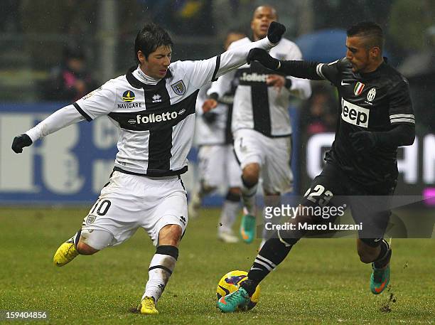 Jaime Valdes of FC Parma competes for the ball with Arturo Vidal of Juventus FC during the Serie A match between Parma FC and Juventus FC at Stadio...