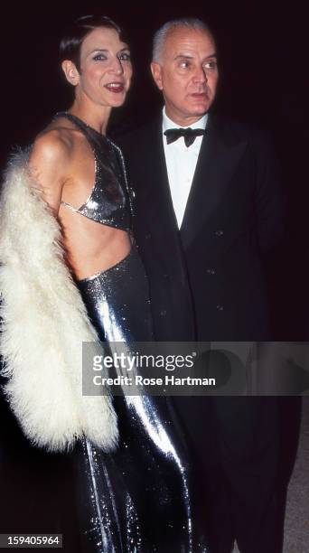 Amy Fine Collins and Manolo Blahnik at art preview, Sotheby's, New York, New York, 1990s.