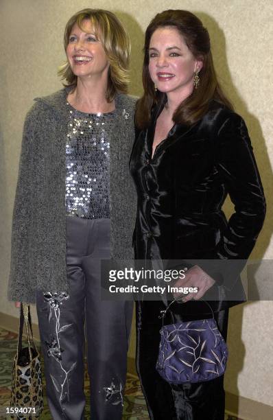 Olivia Newton-John, left, poses with actress Stockard Channing at the 10th Annual Human Rights Campaign Gala, February 17, 2001 in Los Angeles, CA....
