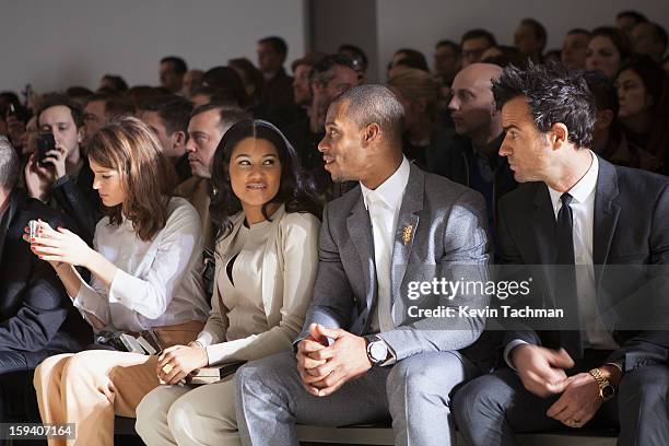 Fashion blogger Hanneli Mustaparta, Elaina Watley, Victor Cruz and Justin Theroux attend the Calvin Klein Collection show as part of Milan Fashion...