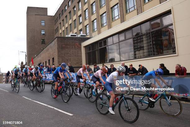 Zoë Van Velzen of Netherlands, Awen Roberts of Great Britain and Sara Piffer of Italy and a general view of the peloton competing during the women...