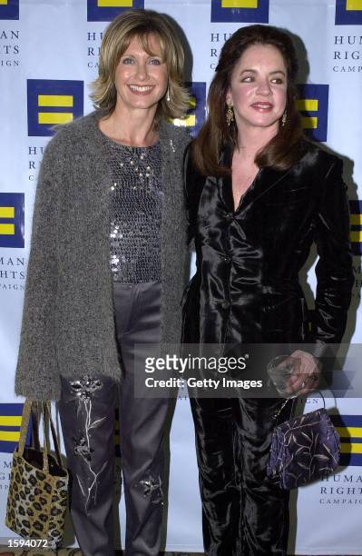 Actress Olivia Newton-John, left, poses with Stockard Channing February 17, 2001 at the 10th Annual Human Rights Campaign Gala in Los Angeles, CA.