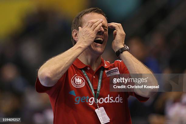Head coach Martin Heuberger of Germany looks dejected during the premilary group A match between Tunisia and Germany at Palacio de Deportes de...