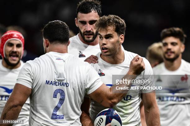 France's wing Damian Penaud reacts with his teammates during the pre-World Cup Rugby Union friendly match between France and Scotland at the...