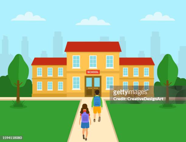rear view of school children with backpacks going to school. back to school concept - nursery school building stock illustrations