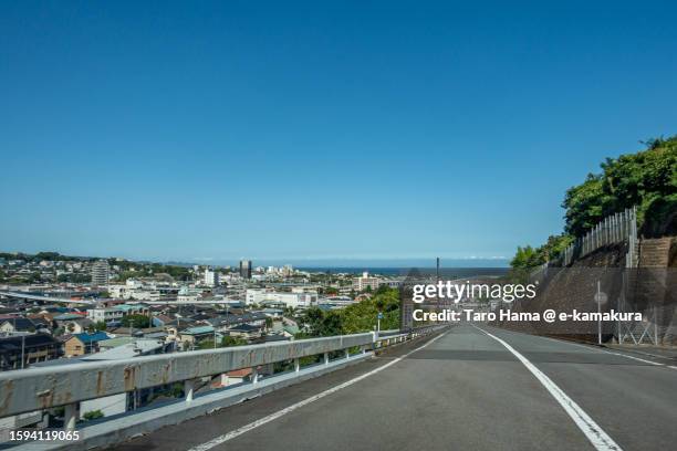 the elevated highway by the sea in kanagawa of japan - kanagawa prefecture stock-fotos und bilder