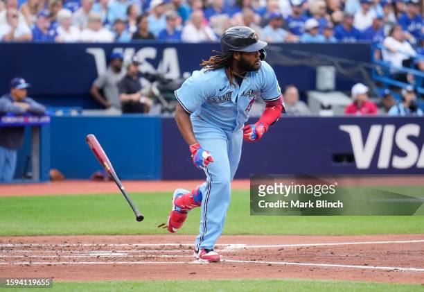 Vladimir Guerrero Jr. #27 of the Toronto Blue Jays hits an RBI single in the third inning against the Chicago Cubs at the Rogers Centre on August 12,...