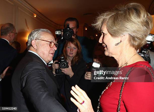 Friede Springer and Hubert Burda attend the 'Geruechte...Geruechte...' premiere at Theater am Kurfuerstendamm on January 13, 2013 in Berlin, Germany.