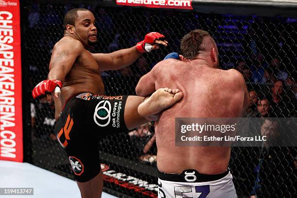 Daniel Cormier kicks Dion Staring in their heavyweight bout during the Strikeforce event on January 12, 2013 at Chesapeake Energy Arena in Oklahoma...