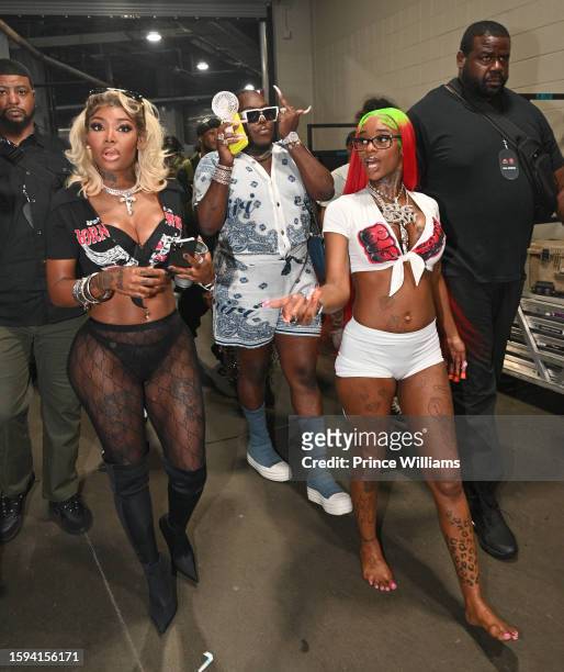 Summer Walker, Saucy Sanatana and Sexyy Red backstage during MoneyBagg Yo Larger Than Life Tour at State Farm Arena on August 4, 2023 in Atlanta,...