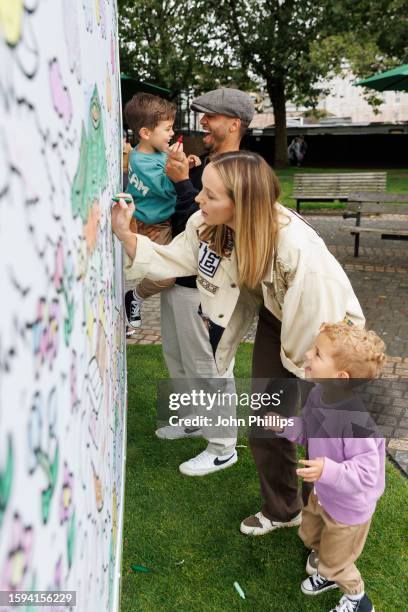 Aston and Sarah Merrygold with their Children at the Volvic Touch of Fruit Sugar Free 'A Touch of Colour' event at Queen's Stone along London's South...