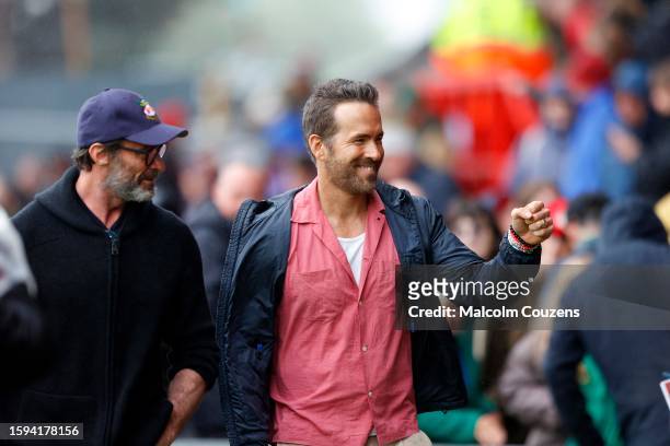 Co-owner of Wrexham Football Club Ryan Reynolds and actor Hugh Jackman meet fans before the Sky Bet League Two match between Wrexham and Milton...