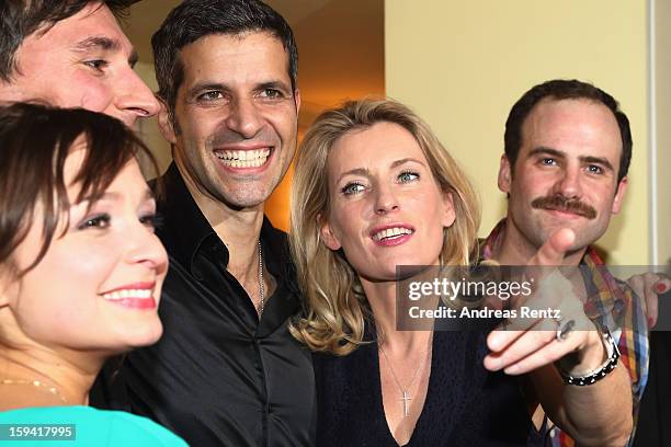 Actress Maria Furtwaengler smiles with her team members Pasquale Aleardi and Urs Staempfli after the 'Geruechte...Geruechte...' premiere at Theater...