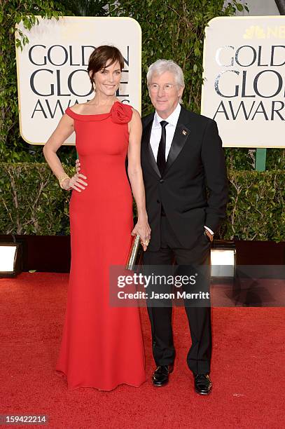 Actor Richard Gere and actress Carey Lowell arrive at the 70th Annual Golden Globe Awards held at The Beverly Hilton Hotel on January 13, 2013 in...