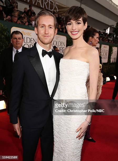 70th ANNUAL GOLDEN GLOBE AWARDS -- Pictured: Actors Adam Shulman and Anne Hathaway arrive to the 70th Annual Golden Globe Awards held at the Beverly...
