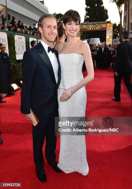 70th ANNUAL GOLDEN GLOBE AWARDS -- Pictured: Actress Anne Hathaway and husband Adam Shulman arrive to the 70th Annual Golden Globe Awards held at the...