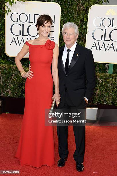 Actress Carey Lowell and actor Richard Gere arrive at the 70th Annual Golden Globe Awards held at The Beverly Hilton Hotel on January 13, 2013 in...