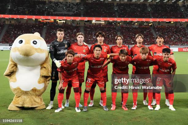 Players of Nagoya Grampus pose for photograph the J.LEAGUE Meiji Yasuda J1 22nd Sec. Match between Nagoya Grampus and Albirex Niigata at the National...