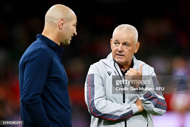 Steve Borthwick, Head Coach of England, speaks with Warren Gatland, Head Coach of Wales, prior to the Summer International match between Wales and...