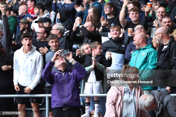 Fans of Swansea City show their support during the Sky Bet Championship match between Swansea City and Birmingham City at Swansea.com Stadium on...