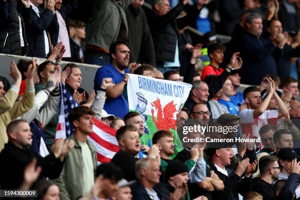 Fans of Birmingham City show their support during the Sky Bet Championship match between Swansea City and Birmingham City at Swansea.com Stadium on...