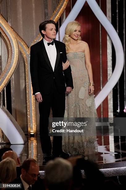 In this handout photo provided by NBCUniversal, Sam Fox, Mister Golden Globes 2013 and Francesca Eastwood, Miss Golden Globe 2013 on stage during the...