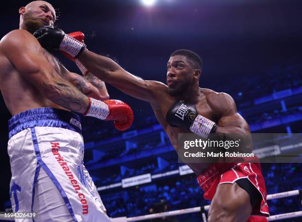 Anthony Joshua and Robert Helenius during their Heavyweight Fight at The O2 Arena on August 12, 2023 in London, England.