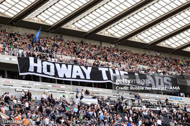 Banner held up by fans of Newcastle United reading 'Howay the lads' during the Premier League match between Newcastle United and Aston Villa at St....