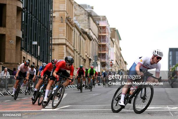 Mikal Uglehus of Norway, Matthew Brennan of Great Britain compete during the men's junior road race at the 96th UCI Glasgow 2023 Cycling World...