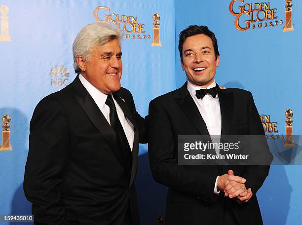 Personalities Jay Leno and Jimmy Fallon pose in the press room during the 70th Annual Golden Globe Awards held at The Beverly Hilton Hotel on January...