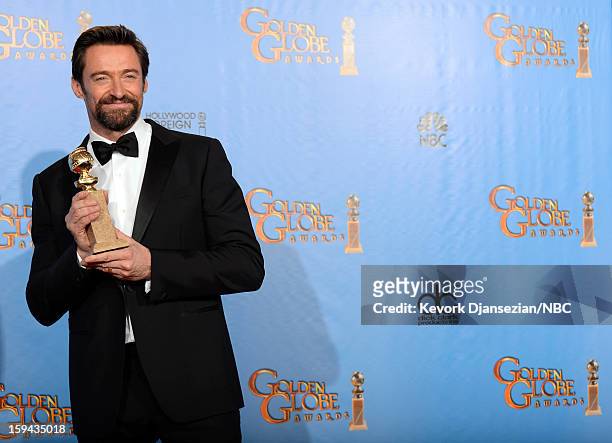 70th ANNUAL GOLDEN GLOBE AWARDS -- Pictured: Actor Hugh Jackman, winner Best Actor in a Motion Picture, Comedy or Musical for 'Les Miserables', poses...