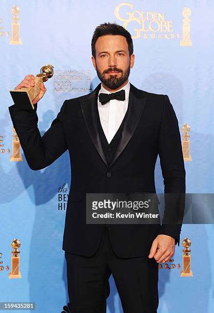 Actor-director Ben Affleck, winner of Best Director ofa Motion Picture for "Argo," poses in the press room during the 70th Annual Golden Globe Awards...