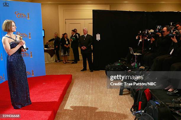 70th ANNUAL GOLDEN GLOBE AWARDS -- Pictured: Actress Jodie Foster poses with Cecil B. Demille Award in the press room at the 70th Annual Golden Globe...