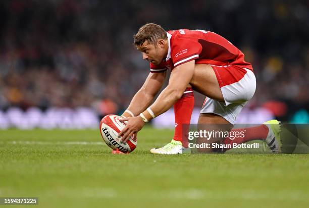 Leigh Halfpenny of Wales looks on as they prepare to kick after being awarded a penalty during the Summer International match between Wales and...