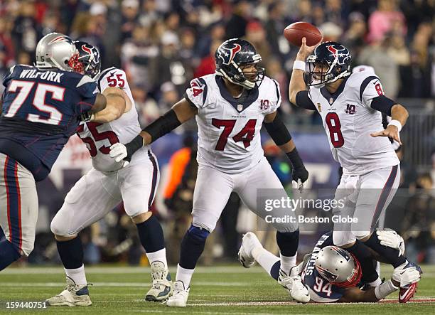 New England Patriots player Justin Francis pressures Houston Texans quarterback Matt Schaub during fourth quarter action as the New England Patriots...