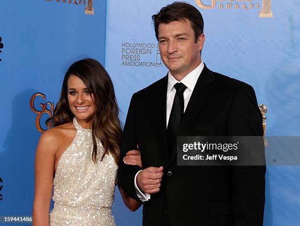 Actors Lea Michele and Nathan Fillion pose in the press room at the 70th Annual Golden Globe Awards held at The Beverly Hilton Hotel on January 13,...