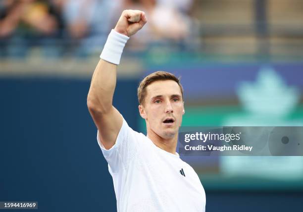 Joe Salisbury of Great Britain celebrates a point against Kevin Krawietz and Tim Puetz of Germany during Day Six of the National Bank Open, part of...