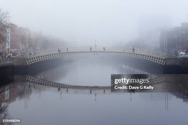 misty morn, dublin town - hapenny bridge stock pictures, royalty-free photos & images