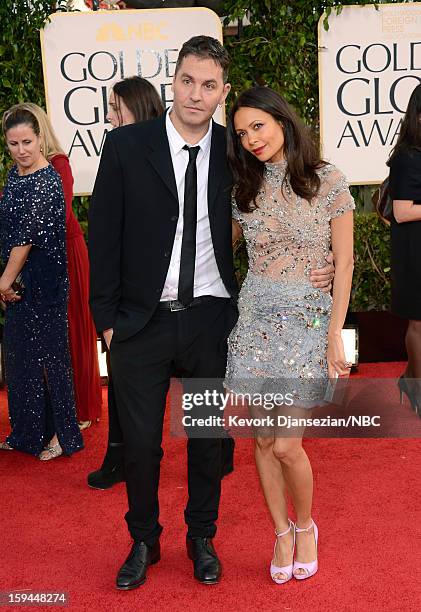 70th ANNUAL GOLDEN GLOBE AWARDS -- Pictured: Producer Ol Parker and actress Thandie Newton arrive to the 70th Annual Golden Globe Awards held at the...