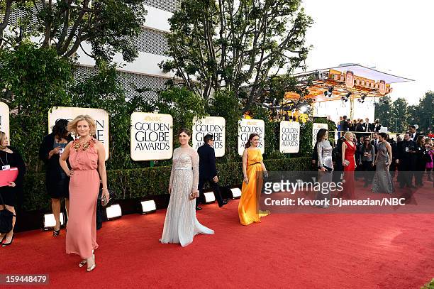 70th ANNUAL GOLDEN GLOBE AWARDS -- Pictured: Actresses Anna Gunn, Mayim Bialik and Alyssa Milano arrive to the 70th Annual Golden Globe Awards held...