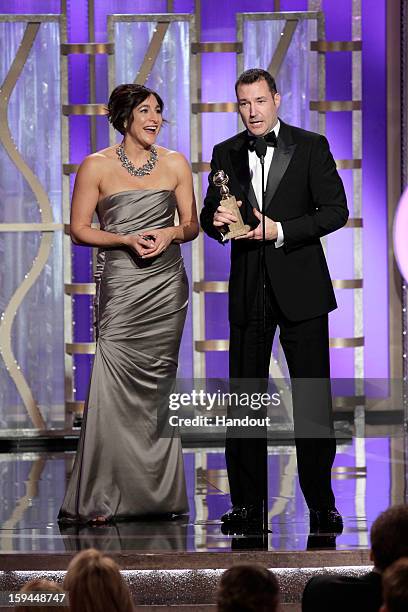 In this handout photo provided by NBCUniversal, Katherine Sarafian, Executive Producer and Mark Andrews, Director accept the award for Best Animated...