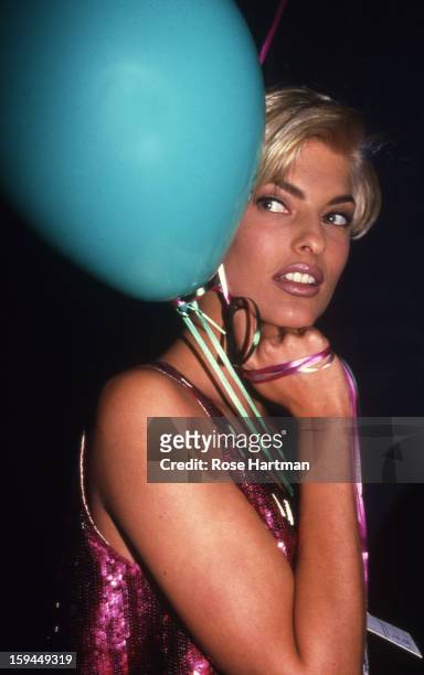 Linda Evangelista, Versace fashion show, Rock 'n' Rule Benefit after party, Park Avenue Armory, New York, New York, 1992.